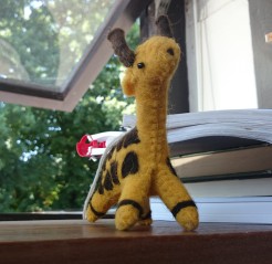 We're all at sometime guilty of seeing wildlife as a cute commodity. Fluffy giraffe looks at me with disapproval